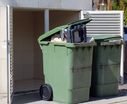 Manager reviewing escalation of a commercial waste complaint